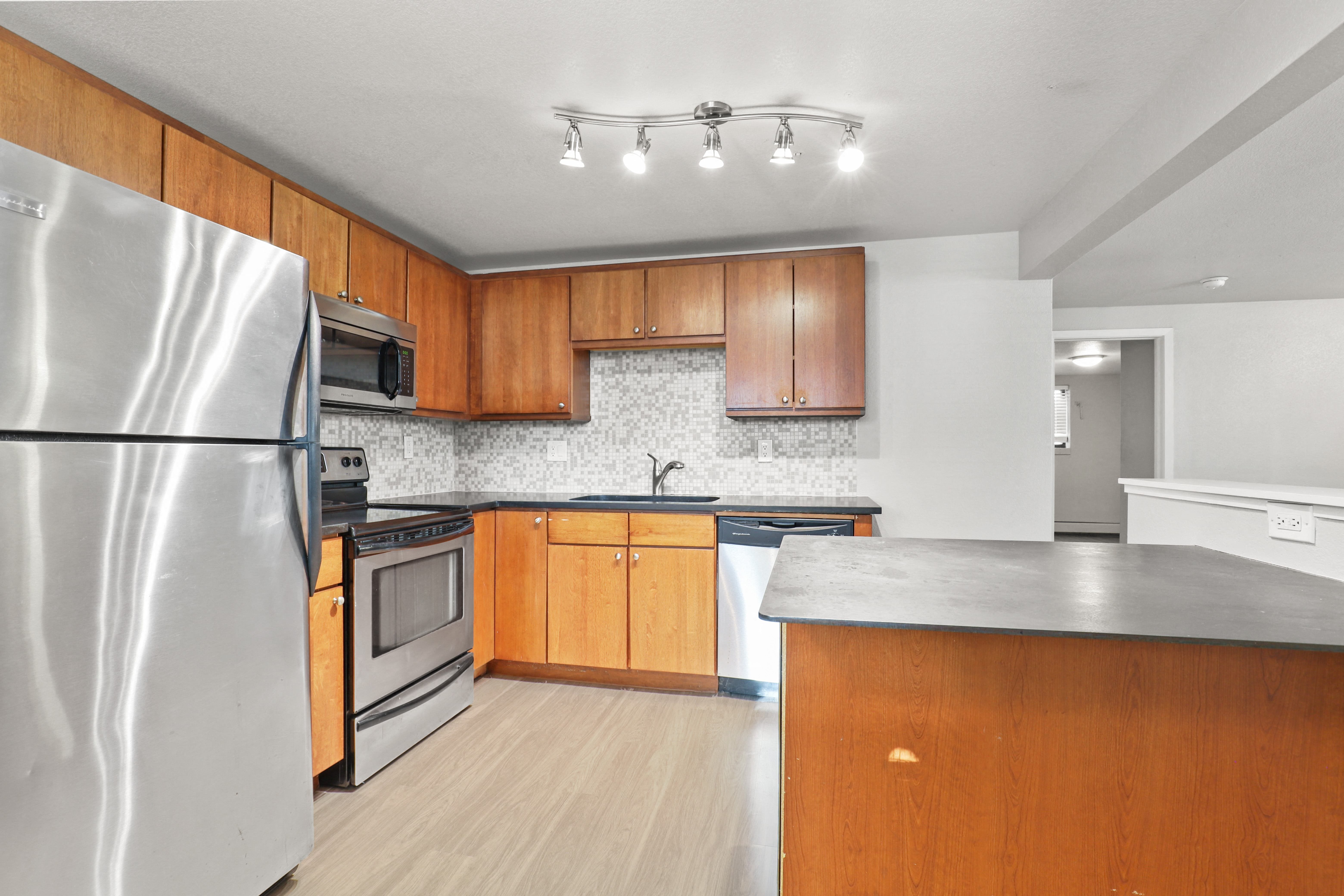 the preserve at ballantyne commons apartment kitchen with stainless steel appliances